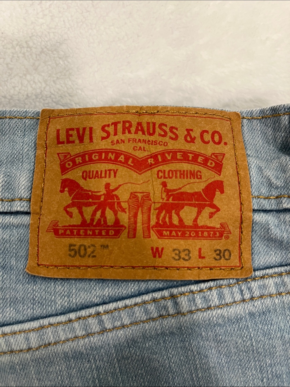 Levi's Straight Men’s Jeans in Light Blue with Tan Leather Patch